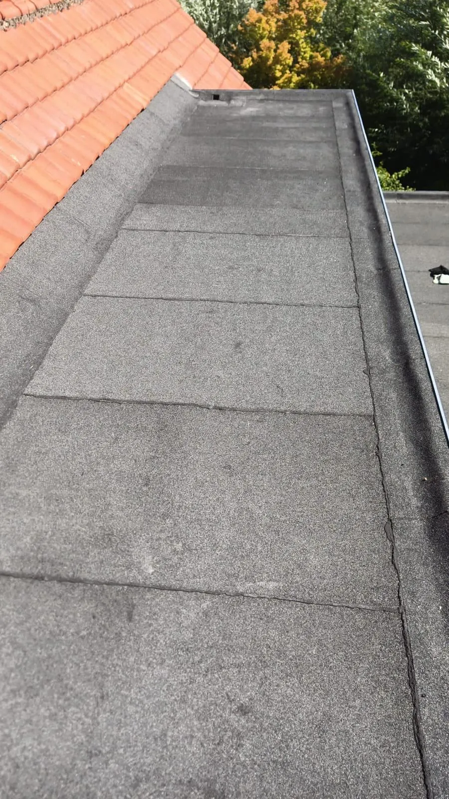 Plat dak met bitumen dakbedekking door CKW Installatietechniek Moerkapelle